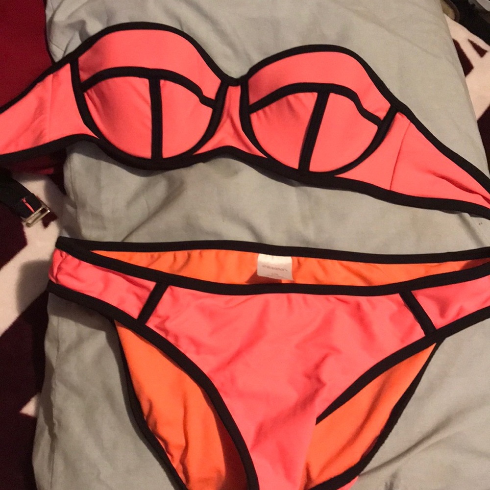 Pink and black bathing suit
